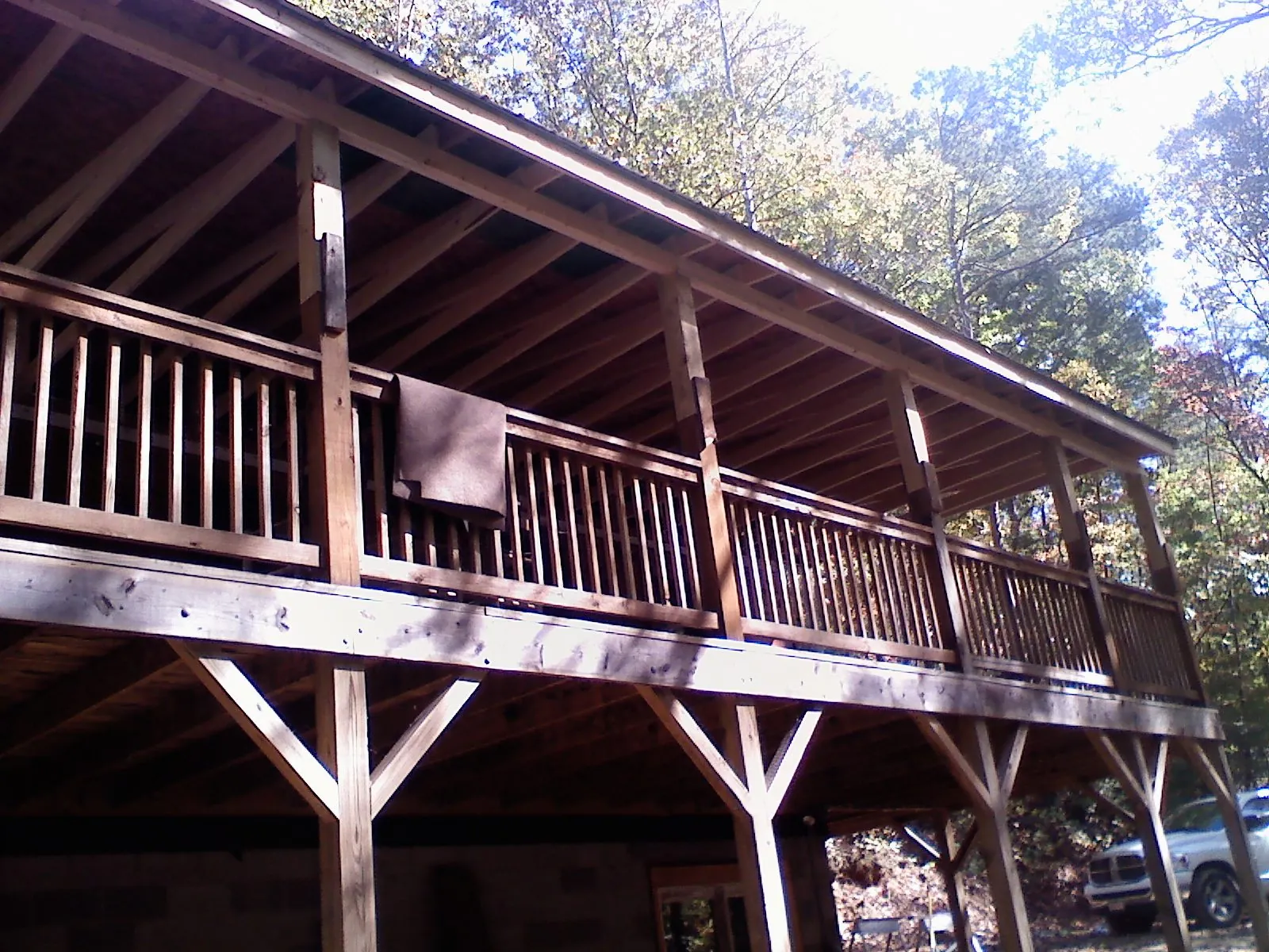 Timber framing under a new elevated porch and deck — Roof Leak Repair in Quitman by Roofing Brothers